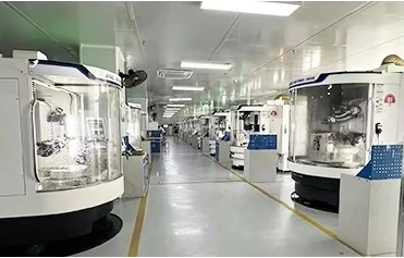 Detail from supplied workshop collage showing a machining equipment aisle.
